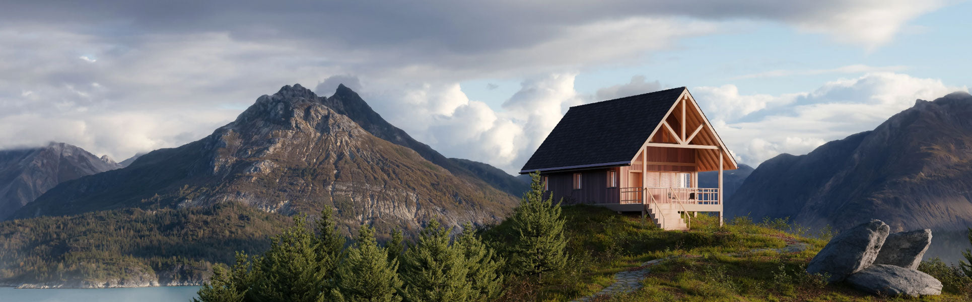 An off-grid cabin sits atop a mountain, overlooking a lake.